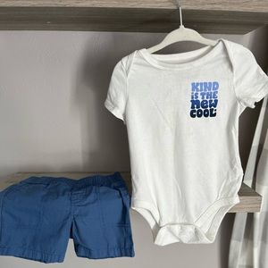 Baby Gap onesie and Carter’s blue shorts